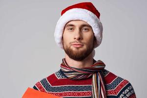 man in Christmas clothes holiday New Year Studio photo