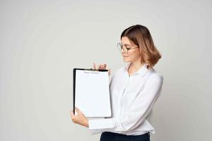 woman in white shirt work documents official professional photo