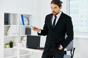 businessman holding a phone telephone office technologies photo