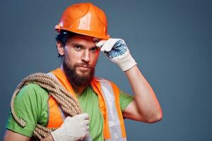 Man in working uniform construction industry cropped view photo