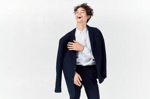 curly-haired guy with a jacket fashion self-confidence business suit photo