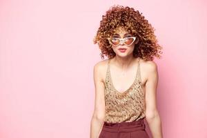 Pretty woman Glasses with white rimmed dress with sequin trousers sequin shirt pink photo