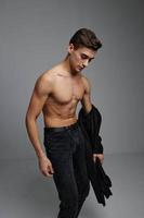 Handsome man nude torso black pants fashion posing portrait attractive photo