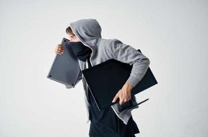 masked man hooded head hacking technology security isolated background photo