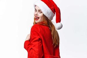 pretty woman wearing santa hat christmas fashion posing photo