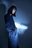 person black cloak dark isolated background casual wear photo