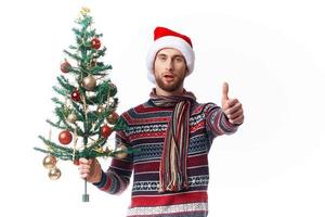 emotional man in New Year's clothes decoration christmas studio posing photo