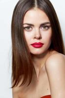 Brunette with bare shoulders confident look forth body care photo