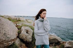 pretty woman sweaters cloudy sea admiring nature female relaxing photo