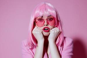 Beautiful fashionable girl bright makeup pink hair glamor stylish glasses color background unaltered photo