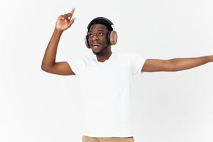 African man wearing headphones in white t-shirt music entertainment photo