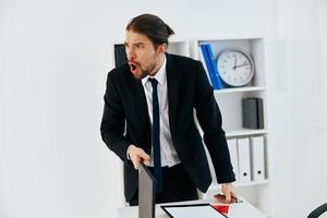 man in a suit holding a phone telephone office lifestyle photo