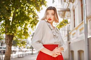 cheerful blonde red lips fresh air in the park close-up photo