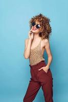 Beautiful woman Lifestyle Studio curly hair smile red lips fashion clothes photo