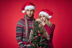 máquina mujer Navidad árbol juguetes romance divertido foto