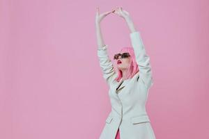 Positive young woman in White blazer pink hair Glamor Cosmetics pink background unaltered photo