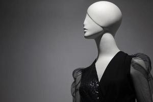 Female mannequin on a gray background. photo