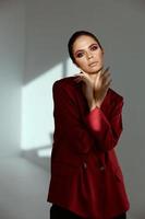 pretty woman in red jacket bright cosmetics model decoration photo