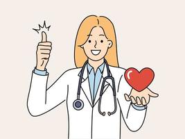 mujer médico con corazón en mano sonriente y demostración pulgar arriba alegría a bueno salud de paciente. niña médico con estetoscopio alrededor cuello trabajos en cardiología Departamento clínica vector