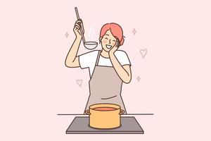 Happy housewife woman cooks soup standing at stove with saucepan and tastes after adding spices. Positive housewife in apron preparing dinner waiting for arrival of boyfriend or husband vector