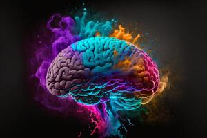 Explosion of cloudy, colorful powder. Freeze motion of color powder exploding, on black background, Concept art of a human brain exploding with knowledge and creativity, . photo