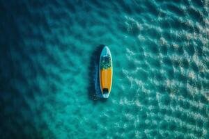 surfboard on ocean clear sea top view copy space photo