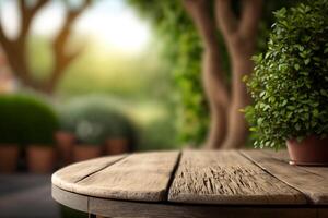 wooden table empty display on green blurred garden background copy space photo