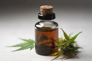 marijuana medicinal oil in small bottle photo