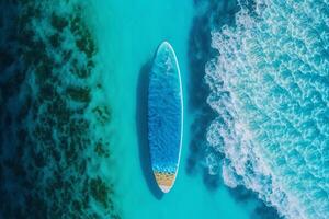 surfboard on ocean clear sea top view copy space photo
