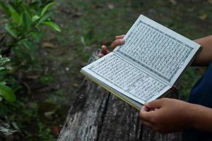 reading the Koran photo