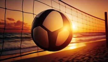 play volleyball on the evening beach against the backdrop of the setting sun photo