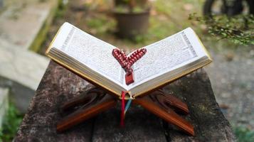 The Noble Quran and tasbih photo