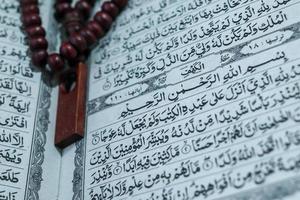 The Noble Quran and tasbih photo
