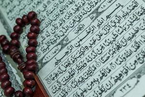 The Noble Quran and tasbih photo