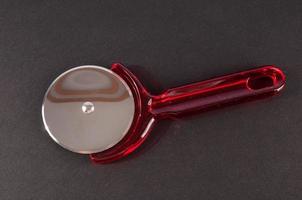 Red pizza slicer photo