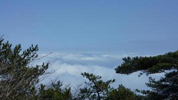 The beautiful mountains landscapes with the green forest and the erupted rock cliff as background in the countryside of the China photo