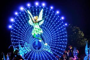 HONG KONG, CHINA - JUN 10- little Angel in Tinker Bell cartoon's parade in Disneyland on June 10, 2015. Hong Kong Disneyland Built in 2012,Is the world's five Disneyland photo