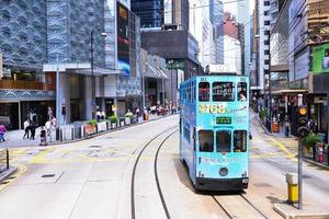 HONG KONG - JUNE 08,Public transport on the street on JUNE 08, 2015 in Hong Kong.  daily travelers use public transport. Trams also a major tourist attraction. photo