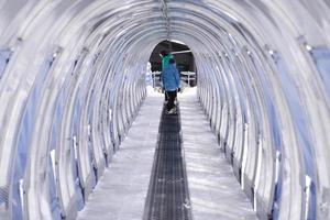 Skiing escalator or moving walkway photo