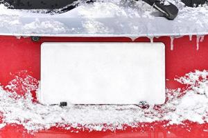 número plato de coche en invierno, nieve foto