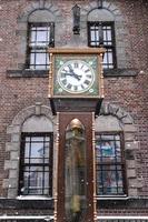 Vintage steam clock tower photo