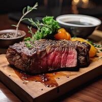 Juicy medium Beef Rib Eye steak slices in a pan on a wooden board with a fork and knife herbs spices and salt. grilled beef steaks with spices on wooden cutting board. photo