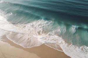 drone view of beach with waves and turquoise water photo