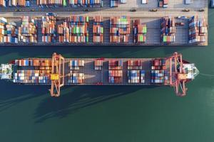Aerial view container ship in port at container terminal port photo