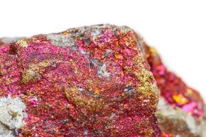 Macro mineral stone Chalcopyrite in the rock on a white background photo