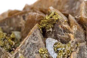 Macro mineral stone Barit Pyrit on a white background photo