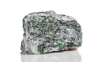 Macro mineral stone Fuchsite on a white background photo