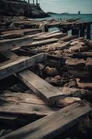 Old wooden pier on the beach at sunset. Selective focus photo