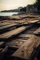 Old wooden pier on the beach at sunset. Selective focus photo