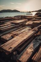 Old wooden pier on the beach at sunset. Selective focus photo